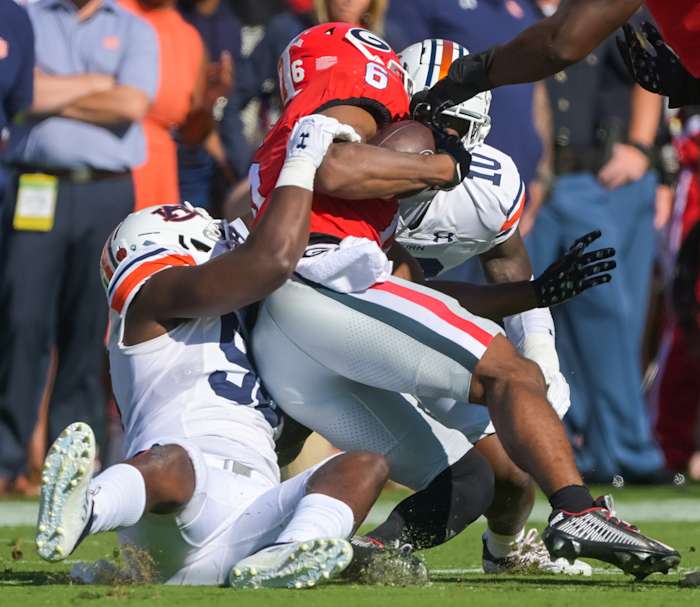 Marcus Bragg and Zion Puckett make a tackle vs Georgia.